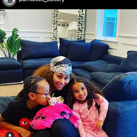 Purrxotics family with adopted Sphynx kitten